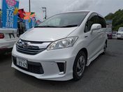 ホンダ フリード　ハイブリッド １．５ ＨＹＢＲＩＤジャストセレ７人