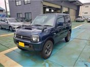 スズキ ジムニー　４ＷＤ ＸＧ　ＴＢ